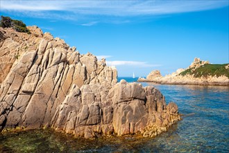 Rocky coast at Cap Camarat with the island Rocher des Portes