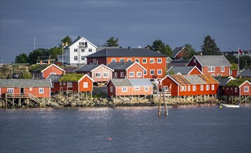 Traditional red stilt houses