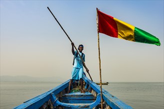 Guinean flag on a boat