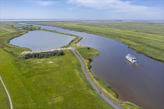 Drone shot with landscape at the Leyhoerner-Sieltief and tourist ship