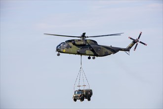 Bundeswehr helicopter with a truck