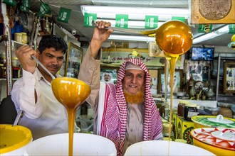 Men selling honey