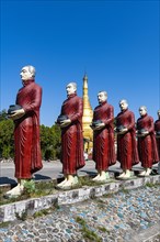 Monk statues lining up