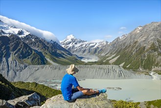 Hiker sitting on a rock