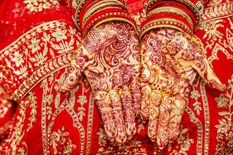 Close up of mehendi on bride's hand