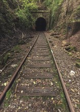 Rail bed with tunnel portal