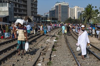 Street vendors on the railway tracks going through Kawran Bazar