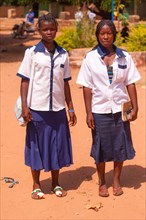 Two African schoolgirls in school uniform