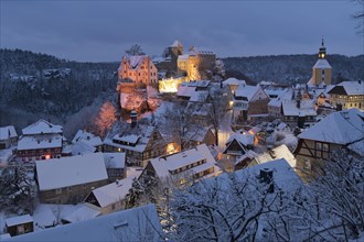Place Hohnstein with rock castle at snow
