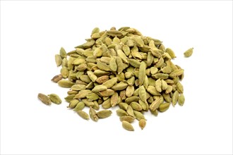 A pile of cardamom pods against a white background