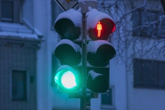 Snowy traffic lights switched to red