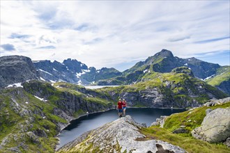 Two hikers looking into camera