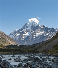 Hooker River in Hooker Valley with view of snow-capped Mount Cook