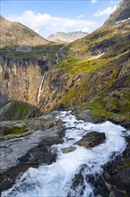 Stigfossen waterfall by the mountain road Trollstigen