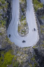 Motorcycles in hairpin bends at the mountain road Trollstigen