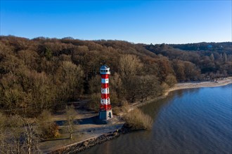 Aerial view of the lighthouse Rissen front light at the river Elbe with Elbe beach