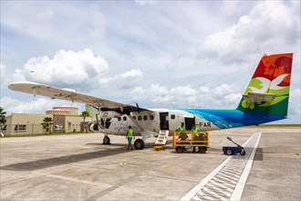 A DHC-6-400 Twin Otter aircraft of Air Seychelles with registration S7-FAR at Mahe Airport