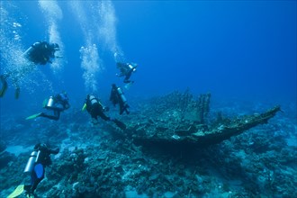 Divers on the wreck of the Heaven One