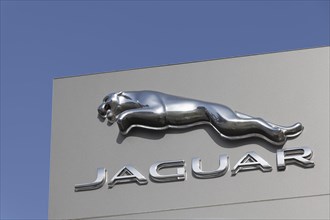 Logo of the car brand Jaguar on a pillar