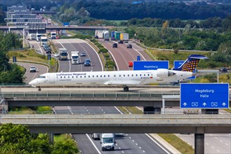 A Bombardier CRJ-900 aircraft of Lufthansa Regional CityLine with the registration D-ACNJ at Leipzig/Halle Airport