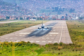 A LAN Airbus aircraft lands at Cuzco airport
