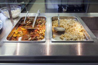 Serving food in a canteen at a vocational college