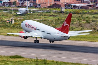 A Peruvian Boeing 737-500 aircraft with registration number OB2124P at Cuzco airport