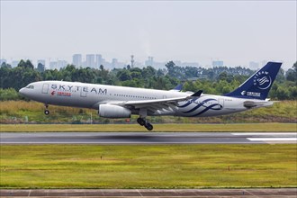 An Airbus A330-200 aircraft of China Eastern Airlines with registration number B-6538 and SkyTeam special livery at Chengdu Airport