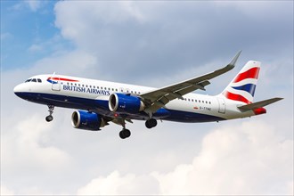 A British Airways Airbus A320neo with registration G-TTNE lands at London Heathrow Airport