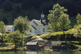 Church in the village Tuftefossen