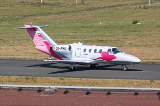 A Cessna 525 CitationJet 1 aircraft of the Pink Sparrow with registration OE-FMU at Dortmund Airport