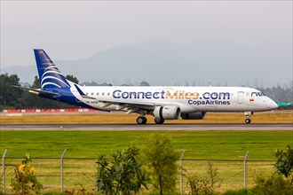 A Copa Airlines Colombia Embraer 190 aircraft with registration HK-4456 and Connect Miles special livery at Bogota Airport
