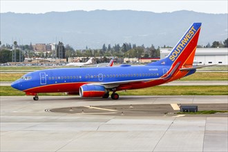 A Southwest Airlines Boeing 737-700 aircraft with registration N700GS at San Jose Airport