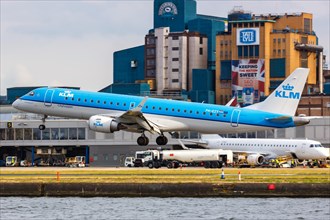 A KLM cityhopper Embraer 190 with registration PH-EZY at London City Airport