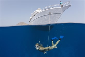 Snorkeling in front of safari ship