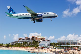 A JetBlue Airways Airbus A320 with the registration N570JB lands at the airport of St. Maarten