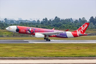 An AirAsia X Airbus A330-300 aircraft with registration number 9M-XXJ in Sony Noise Cancelling special livery at Chengdu Airport