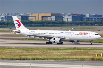 An Airbus A330-300 aircraft of China Eastern Airlines with registration number B-5969 at Guangzhou Baiyun Airport
