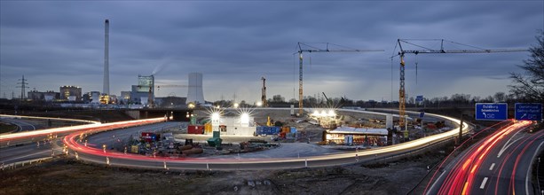 Panorama motorway junction A 43 with A 42 with power station Herne and construction site in the evening