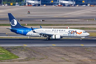 A Boeing 737-800 aircraft of SDA Shandong Airlines with registration number B-7978 at Shanghai airport