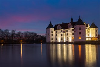 Gluecksburg moated castle at blue hour