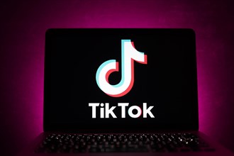 TikTok app logo on the screen of a laptop