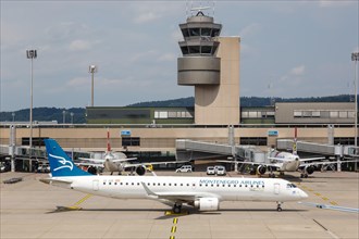 An Embraer 195 aircraft of Montenegro Airlines with registration number 4O-AOB at Zurich Airport