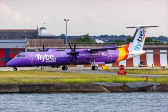 A Flybe Bombardier DHC-8-400 with registration G-PRPC at London City Airport