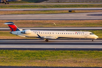 A Bombardier CRJ-900 aircraft of Delta Connection Endeavor Air with registration N325PQ at Atlanta Airport