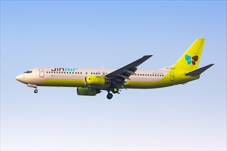 A JinAir Boeing 737-800 with registration HL7555 lands at Seoul Incheon Airport