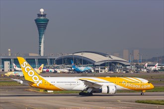 A Boeing 787-9 Dreamliner aircraft operated by Scoot with registration number 9V-OJJ at Guangzhou Airport