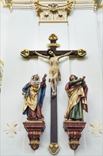 Christ on the cross with mourning figures