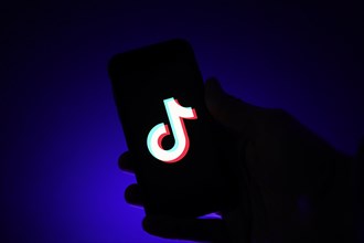 TikTok app on a smartphone in a hand