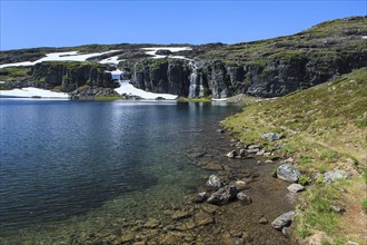 Mountain lake in Bjorgavegen highlands